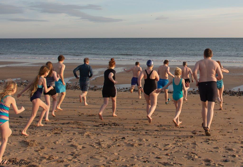 New Year dip, wild swimmers on Shandwick Beach